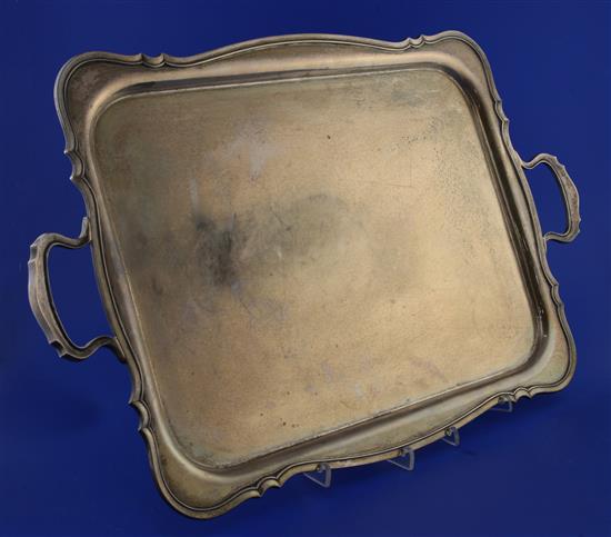 A 1930s silver two handled tea tray, 86 oz.